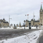 Wellington Street and Parliament Hill, seen from Metcalfe Street on March 4, 2022. The street is now empty except for a few pedestrians and official vehicles–a huge contrast from the recent convoy occupation. Alayne McGregor/The BUZZ
