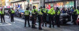 Police (here on Rideau Street on Friday evening) were more visible during the “Rolling Thunder” protest April 29 to May 1 than during the convoy occupation. (Alayne McGregor/The BUZZ)