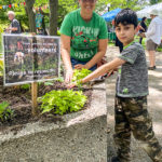 Children had the chance to play in the dirt with plants at the CCA Gardening Festival in Dundonald Park on June 11. (Jack Hanna/The BUZZ)