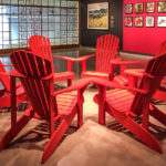 Don Kwan says that his sculpture “This land is my land, this land is your land” in his Ottawa Art Gallery exhibit uses Muskoka chairs to create a sculpture that “hints to the Canadian history of inclusion and exclusion when it comes to Chinese immigrants.” (Alayne McGregor/The BUZZ)