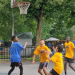 Young players were assigned to either the gold and blue basketball teams in the St. Luke’s Family Fun Fest on July 29 in St. Luke's Park. (Gail McGuire/The BUZZ)