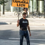 A supporter of Tamara Lich in front of the Ottawa Courthouse on September 5, the first day of her trial for her role in organizing the Freedom Convoy. (Alayne McGregor/The BUZZ)