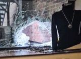 Thieves broke this window with a metal ashtray to get in and ransack Dress for Success’ boutique. (Dress for Success)