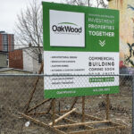 This sign recently appeared in the long-vacant lot at 816 Somerset Street West, indicating that OakWood Design & Build was planning a four-unit commercial building there, to be started this spring. (Alayne McGregor/The BUZZ)