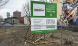 This sign recently appeared in the long-vacant lot at 816 Somerset Street West, indicating that OakWood Design & Build was planning a four-unit commercial building there, to be started this spring. (Alayne McGregor/The BUZZ)